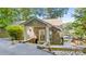 Inviting stone and siding facade with stylish entrance and stone walkway to the lake at 208 Island View Rd, Mount Holly, NC 28120