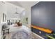 Bright living room with soaring ceilings, large windows, and stylish decor at 208 Island View Rd, Mount Holly, NC 28120