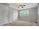 A carpeted room with a ceiling fan, and natural light from a window at 2215 Hodgin St, Gastonia, NC 28056