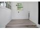 Clean, bright laundry room with fresh paint and new flooring at 2215 Hodgin St, Gastonia, NC 28056