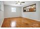 Spacious living room with hardwood floors and plenty of natural light at 2215 Hodgin St, Gastonia, NC 28056