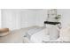 Serene bedroom showcasing neutral tones, soft textures, and natural light creating a calming oasis at 233 Wheatfield Dr # 102P, Statesville, NC 28677