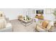 Bright and airy living room featuring modern decor, comfortable seating, and lots of natural light at 233 Wheatfield Dr # 102P, Statesville, NC 28677