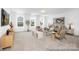 Spacious living room with modern furnishings, bright windows, and an open layout perfect for entertaining guests at 233 Wheatfield Dr # 102P, Statesville, NC 28677