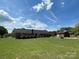 Spacious backyard with lush greenery, ideal for outdoor activities and relaxation at 2515 Myra Ln, Lincolnton, NC 28092