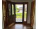 Bright entryway with hardwood floors, wooden doors, and a clear view of the front yard at 2515 Myra Ln, Lincolnton, NC 28092