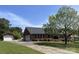 Spacious home with detached garage, set on a large lot with mature trees and long driveway at 2515 Myra Ln, Lincolnton, NC 28092