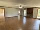 Bright and spacious living room with hardwood floors, fireplace, and backyard access at 2515 Myra Ln, Lincolnton, NC 28092