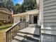 Charming entryway with a gray stairway, white door and trim, and views to the house interior at 27 Quayside Ct, Clover, SC 29710