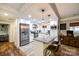 Bright kitchen featuring white cabinets, a granite island, and stainless steel appliances at 2984 Starnes Dr, Rock Hill, SC 29730