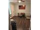 Cozy home office featuring hardwood floors and a unique wooden American flag wall decoration at 3210 Crow Row, Monroe, NC 28112