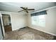 Comfortable bedroom with carpeting and natural light, ideal for relaxation and rest at 34107 Watson Rd, Albemarle, NC 28001