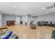 Large, open basement area complete with bar, lounge area, and laminate floors at 3916 2Nd Street Nw Dr, Hickory, NC 28601