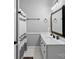 Clean bathroom featuring a modern vanity, framed mirror, and shower with curtain at 3916 2Nd Street Nw Dr, Hickory, NC 28601