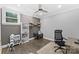 Well-lit office space with decorative shelving, providing an ideal remote work environment at 3916 2Nd Street Nw Dr, Hickory, NC 28601