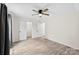 Bedroom with ceiling fan and a double door closet at 529 N Central Ave, Locust, NC 28097