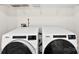 Laundry room features new Whirlpool washer and dryer at 529 N Central Ave, Locust, NC 28097