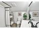Modern bathroom features a shower with white subway tile and a black framed mirror at 617 Rock Hill Church Rd, Matthews, NC 28104