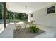 Spacious covered patio offers a perfect spot for outdoor gatherings at 617 Rock Hill Church Rd, Matthews, NC 28104