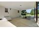 Relax on the covered patio with backyard views, ideal for entertaining at 617 Rock Hill Church Rd, Matthews, NC 28104