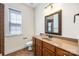 Bathroom vanity with a decorative mirror and shower area at 646 Quicksilver Trl # 183, Fort Mill, SC 29708