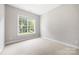 Neutral bedroom with a large window providing natural light at 646 Quicksilver Trl # 183, Fort Mill, SC 29708