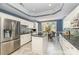Modern kitchen with stainless steel appliances, and an eat-in island at 6602 Gaywind Dr, Charlotte, NC 28226