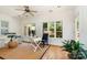 Bright office space with hardwood floors, a large window, and comfortable seating and decor at 6602 Gaywind Dr, Charlotte, NC 28226