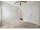 Bright bedroom with carpet, closet, and neutral color palette at 703 Dalebrook Ln, Rock Hill, SC 29730