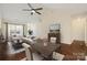 Bright living room features hardwood floors, vaulted ceiling, and neutral paint colors at 703 Dalebrook Ln, Rock Hill, SC 29730