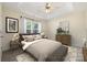 Tranquil primary bedroom features a trey ceiling, neutral paint and plush carpeting at 703 Dalebrook Ln, Rock Hill, SC 29730
