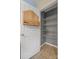 This pantry has wire shelving and a spice rack on the back of the door for extra storage at 703 Dalebrook Ln, Rock Hill, SC 29730