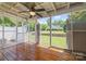 Relax on this screened-in porch with wood floors and enjoy the beautiful backyard view at 703 Dalebrook Ln, Rock Hill, SC 29730