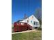 Exterior view of the home featuring a red deck and well-kept backyard at 706 13Th Sw St, Hickory, NC 28602