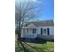 Charming home with front porch, black shutters, and well-maintained lawn showcasing curb appeal at 706 13Th Sw St, Hickory, NC 28602