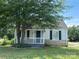 Attractive home with a delightful front porch, stylish stone accents, and lush green lawn at 706 13Th Sw St, Hickory, NC 28602