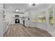 Bright kitchen with white cabinets, stainless steel appliances, and plenty of counter space at 7219 Spring Morning Ln, Charlotte, NC 28227