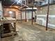 Unfinished basement with ladder at 743 S College Ave, Newton, NC 28658
