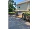 View of the long driveway leading to a garage beneath the home at 743 S College Ave, Newton, NC 28658