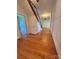 Traditional foyer with hardwood floors, staircase, and paneled walls at 743 S College Ave, Newton, NC 28658