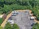 Exterior view of a boat storage parking lot surrounded by lush greenery, perfect for storing boats at 7717 Nautical View Dr, Denver, NC 28037