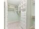 Bright walk-in closet features custom shelving and drawer storage at 827 Museum Dr, Charlotte, NC 28207