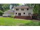 Beautiful home featuring a large deck great for entertaining and lush backyard at 9424 Whitethorn Dr, Charlotte, NC 28277