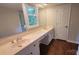 Spacious bathroom features a double sink vanity and a large mirror at 9424 Whitethorn Dr, Charlotte, NC 28277