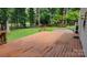 Enjoy outdoor living on this spacious deck overlooking the backyard, perfect for entertaining at 9424 Whitethorn Dr, Charlotte, NC 28277
