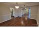 Traditional dining room with a view into the living room and kitchen at 9424 Whitethorn Dr, Charlotte, NC 28277