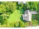 Bird's-eye view of a home with a spacious lawn and tree coverage for privacy at 953 Milkwood Ln, Monroe, NC 28110