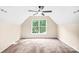 Spacious bedroom with a large window, natural light, and a ceiling fan at 953 Milkwood Ln, Monroe, NC 28110