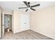Bedroom featuring neutral walls, carpet, and a closet with white double doors at 953 Milkwood Ln, Monroe, NC 28110