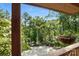 Relaxing back porch overlooking a wooded area with lake views at 1119 Palmyra Dr, Fort Mill, SC 29708